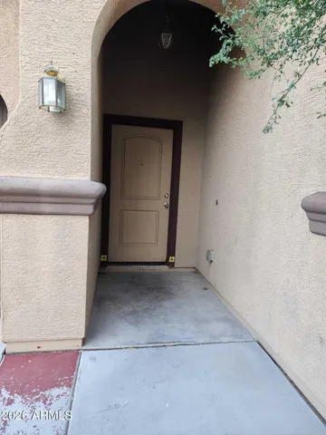 a view of an empty room with a fireplace
