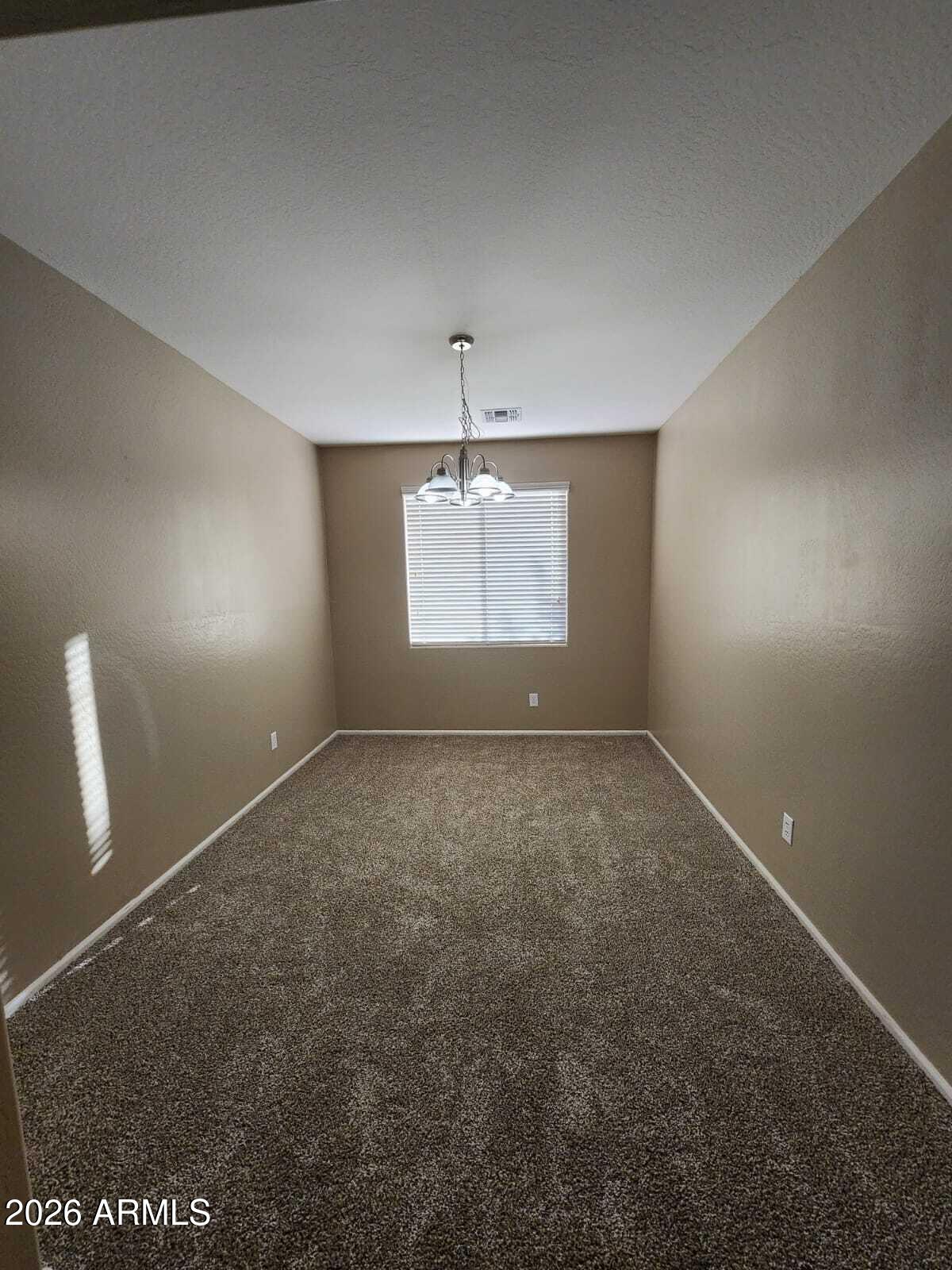 7643 West Charter Oak Road Peoria, AZ 85381 - Photo 6 of 27 a view of room and window