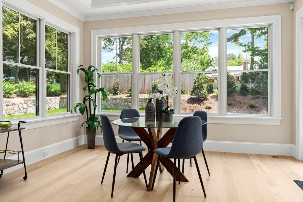 46 Exeter Street Newton, MA 02465 - Photo 15 of 40 a dining room with furniture window outside view and wooden floor
