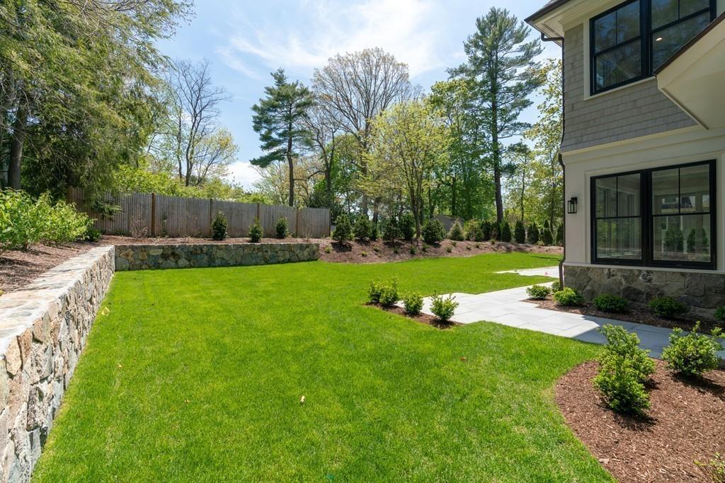 46 Exeter Street Newton, MA 02465 - Photo 40 of 40 a view of a house with backyard and sitting area