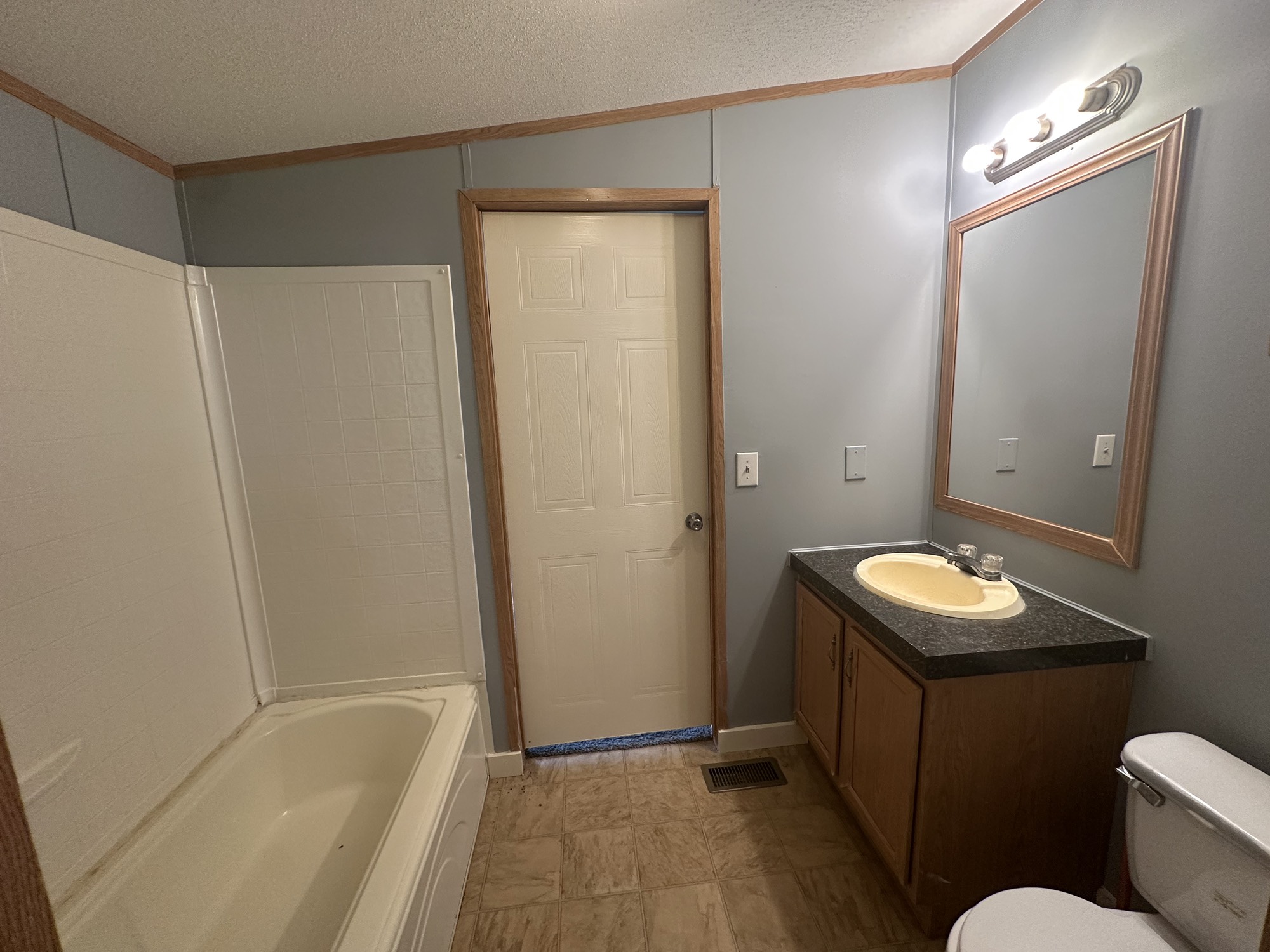 2229 Meekins Road Cleveland, TX 77328 - Photo 26 of 48 a bathroom with a sink and a mirror