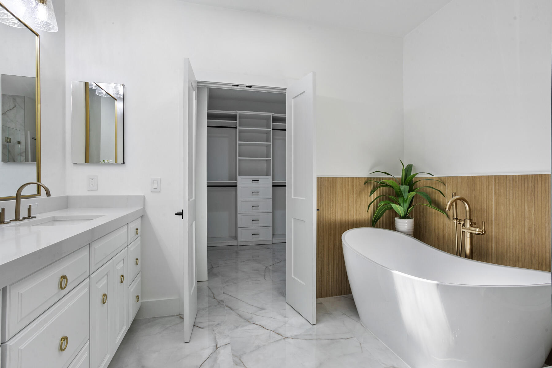 15810 Windrift Drive Jupiter, FL 33477 - Photo 27 of 52 a living room with furniture and a potted plant