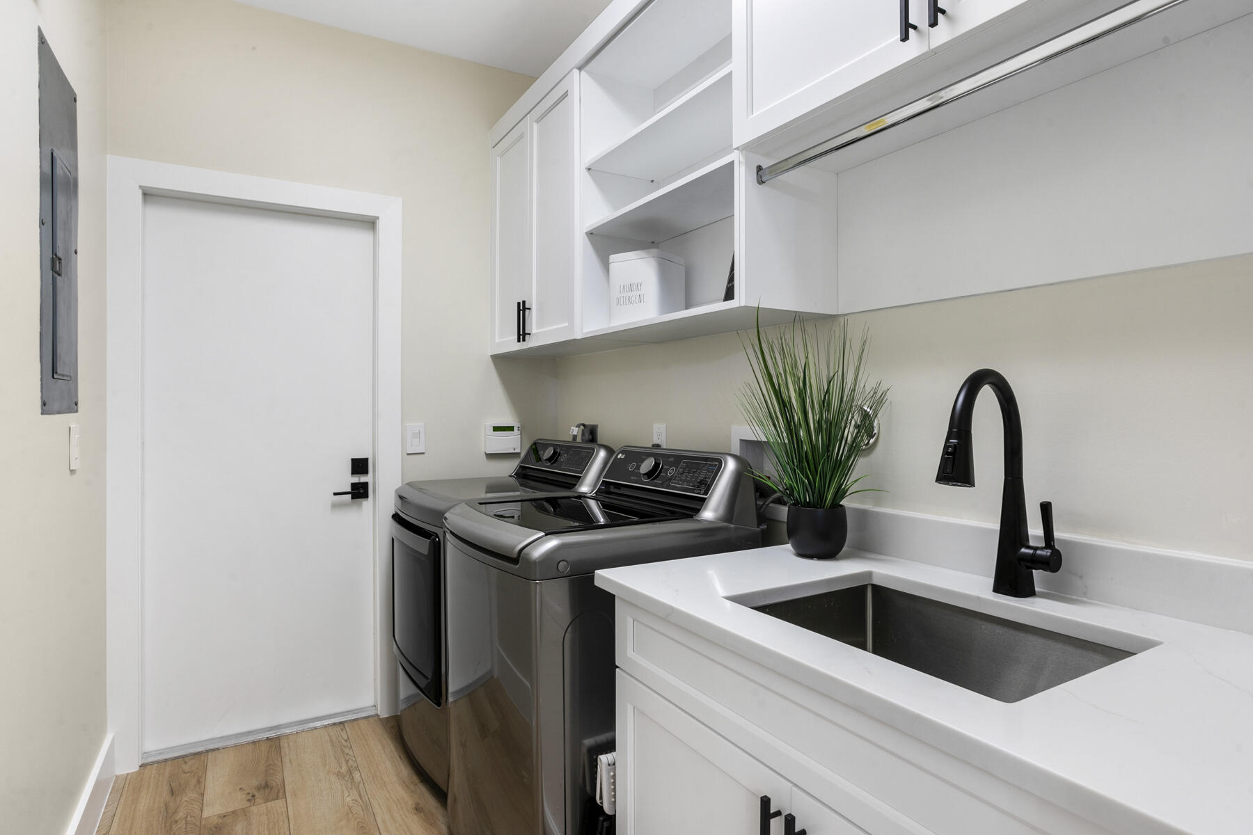 15810 Windrift Drive Jupiter, FL 33477 - Photo 37 of 52 a close view of a sink and dishwasher in kitchen