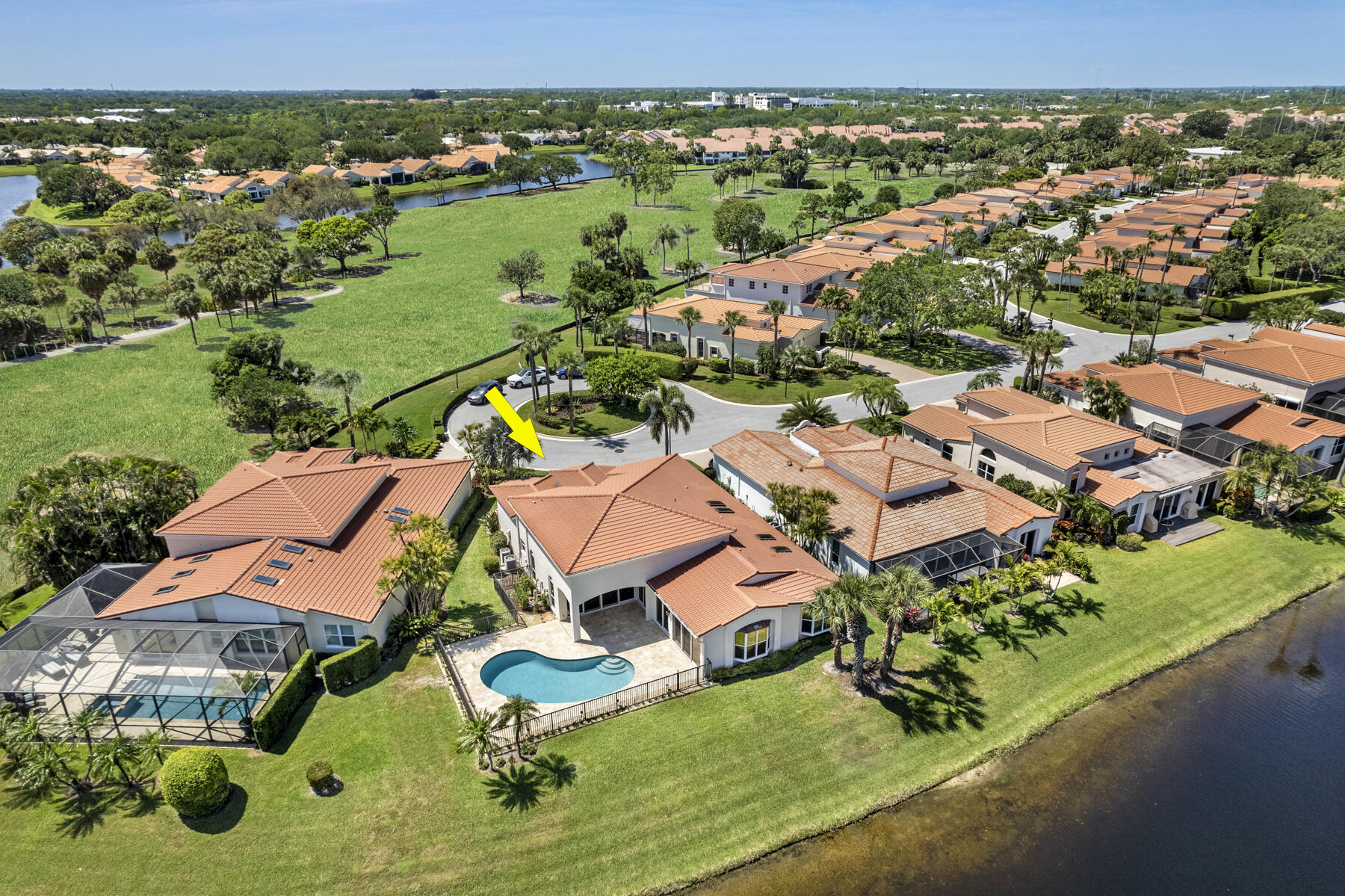 15810 Windrift Drive Jupiter, FL 33477 - Photo 52 of 52 an aerial view of residential houses with outdoor space
