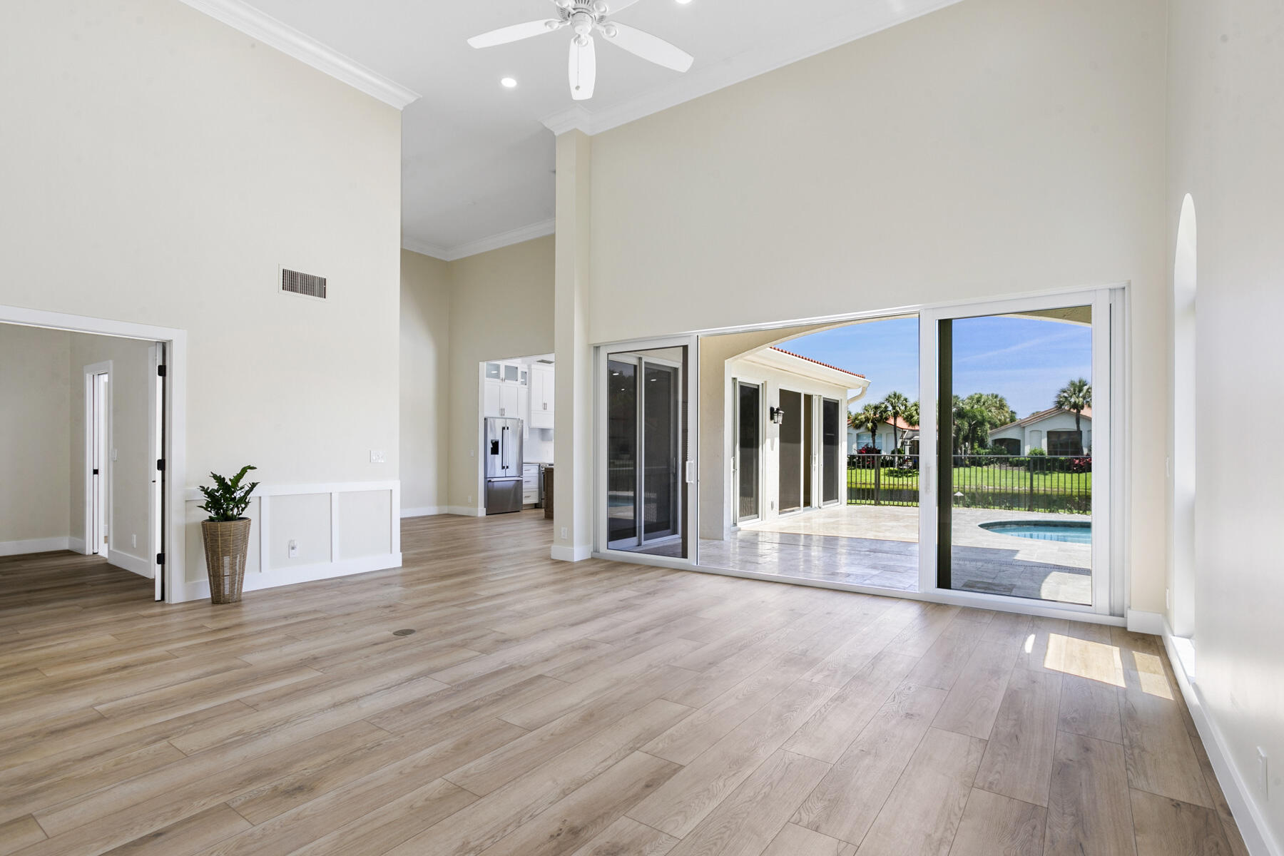 15810 Windrift Drive Jupiter, FL 33477 - Photo 8 of 52 a view of a house with wooden floor