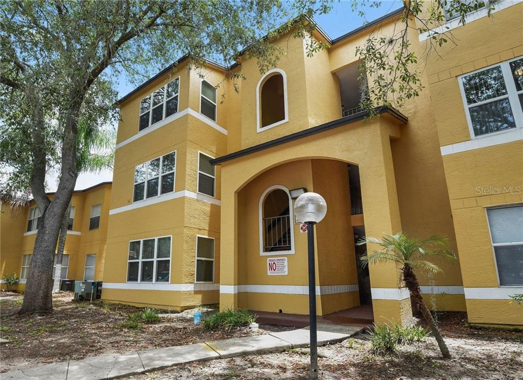 4512 Commander Drive, Unit 1725 Orlando, FL 32822 - Photo 1 of 1 a front view of a house