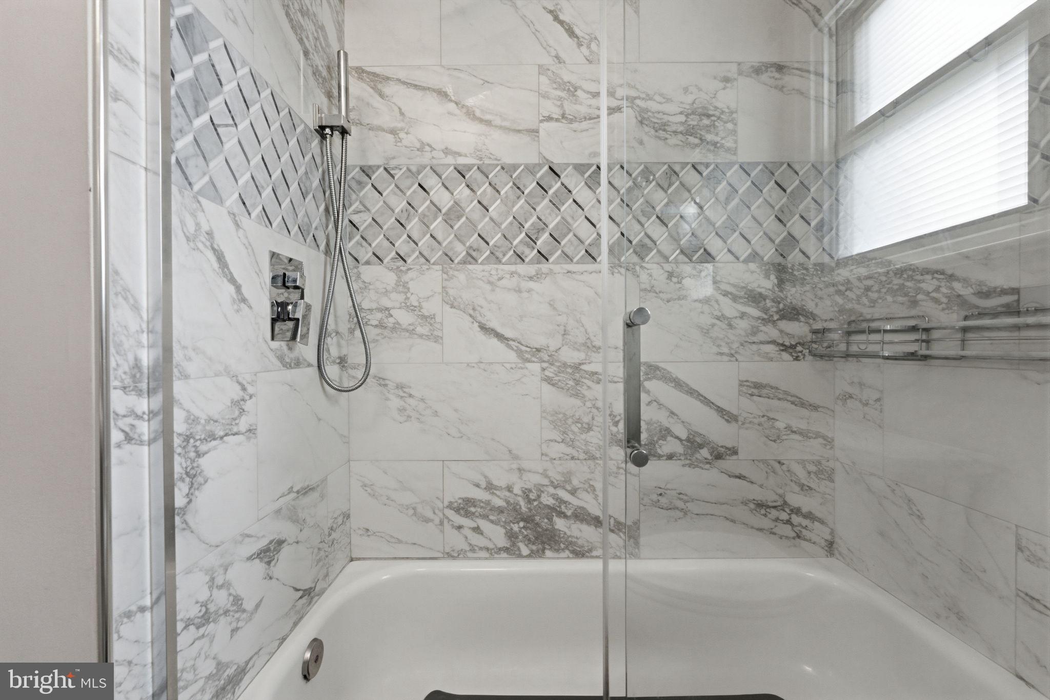 1717 Pennrock Road Wilmington, DE 19809 - Photo 25 of 41 a bathroom with a bathtub