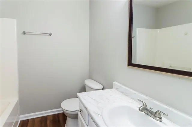 a bathroom with a sink and a toilet