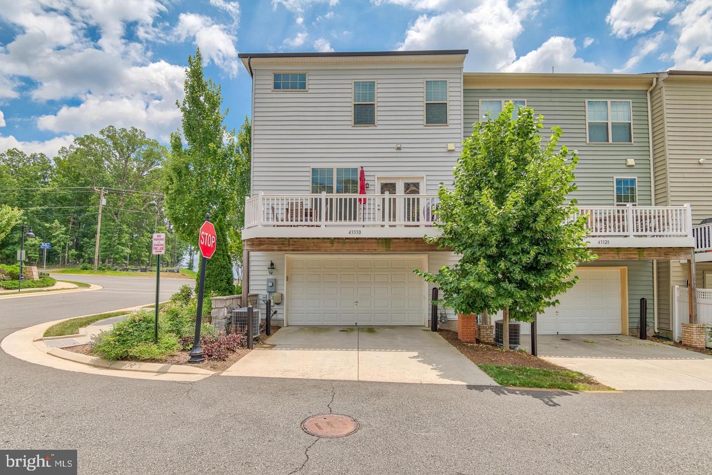 43330 Old Ryan Road Ashburn, VA 20148 - Photo 2 of 3 a front view of a house with garden