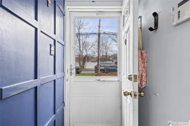 a bathroom with a shower and a window