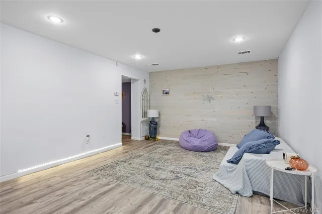 a view of a livingroom with furniture