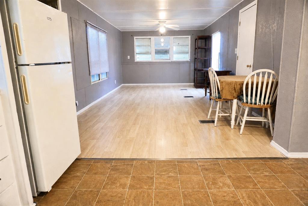 980 7th Street Northwest, Unit 71 Largo, FL 33770 - Photo 6 of 23 a view of kitchen with furniture and refrigerator