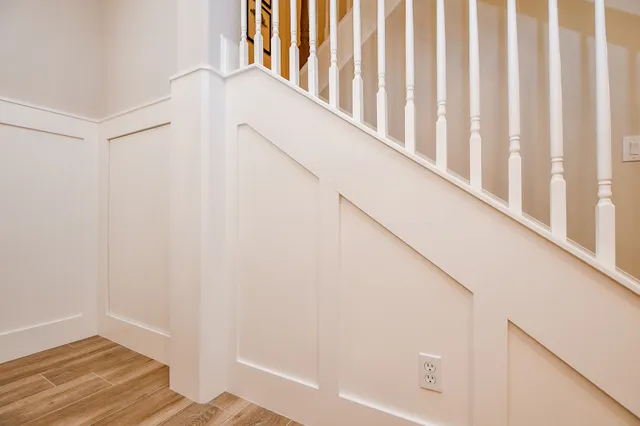 a view of balcony with wooden floor