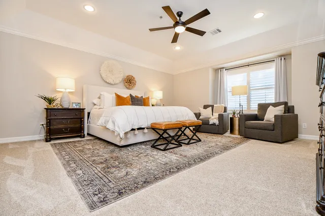 a bed room with a bed and furniture