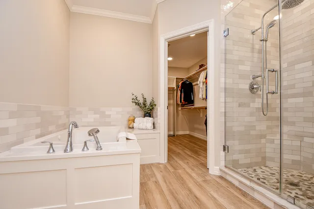 a view of a bathroom with a bathtub and a sink
