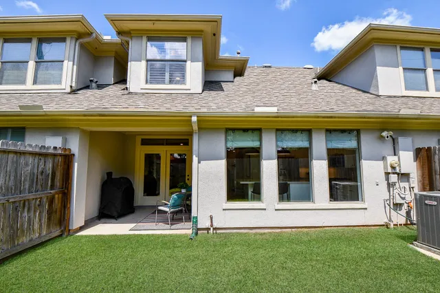 a view of a building with a garden