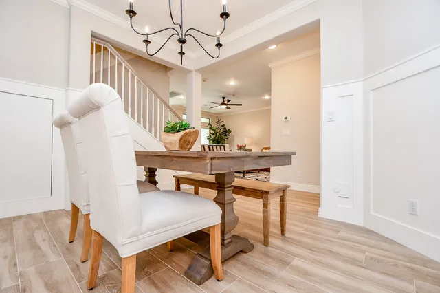 a living room with dining table