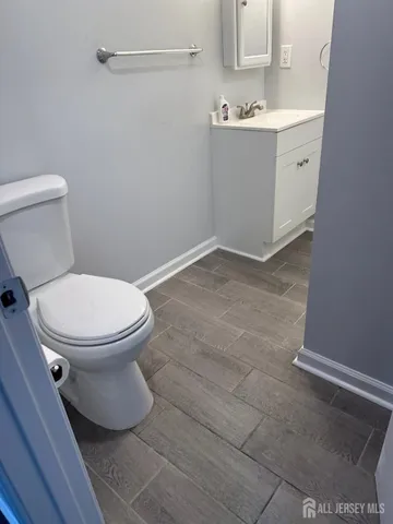 a bathroom with a sink and a toilet