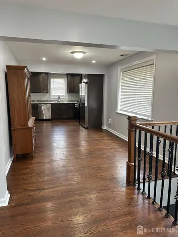 a view of a kitchen with a sink