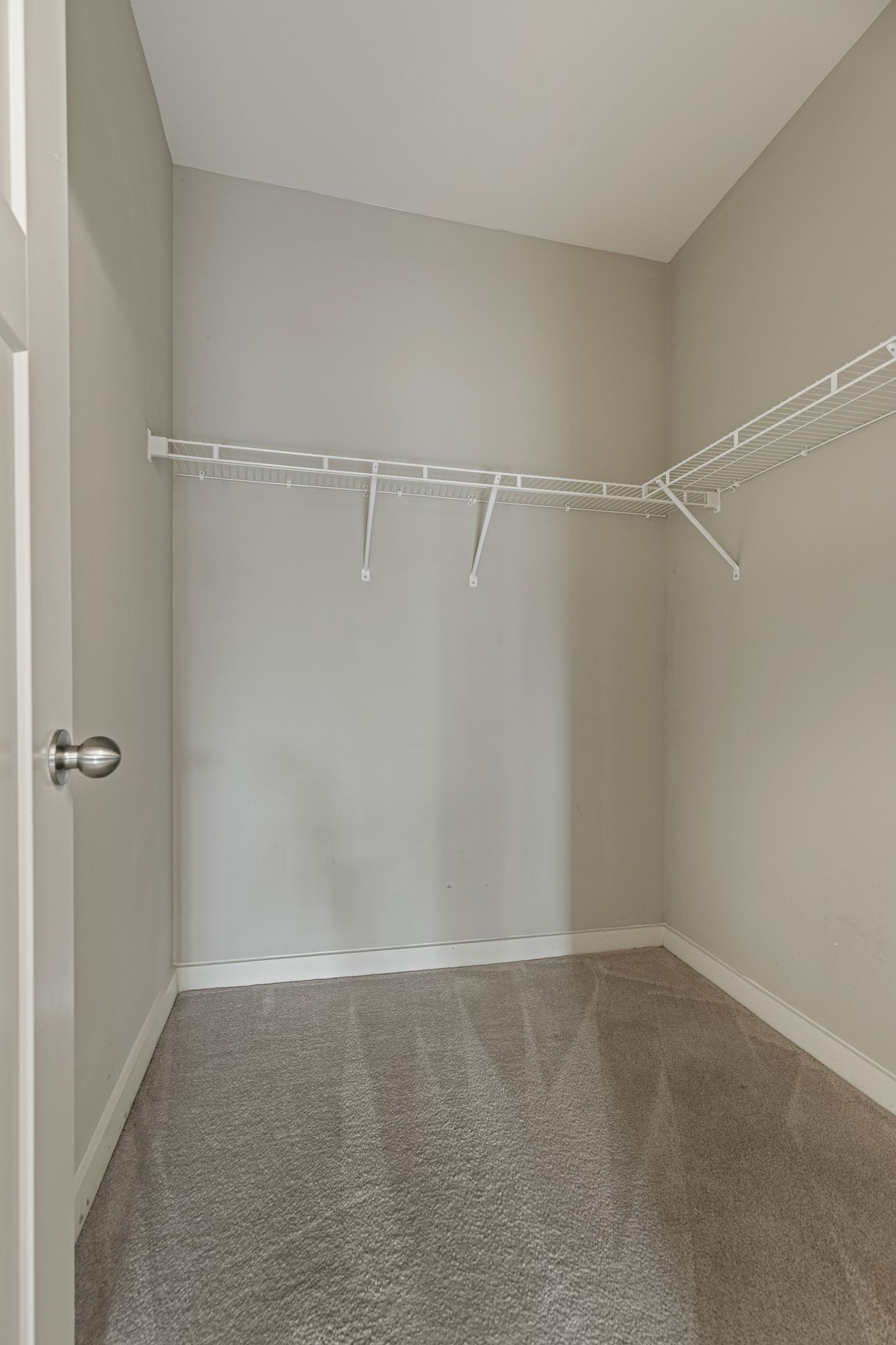 410 Rosedale Avenue, Unit 302 Nashville, TN 37211 - Photo 11 of 13 a view of a room with racks on the wall