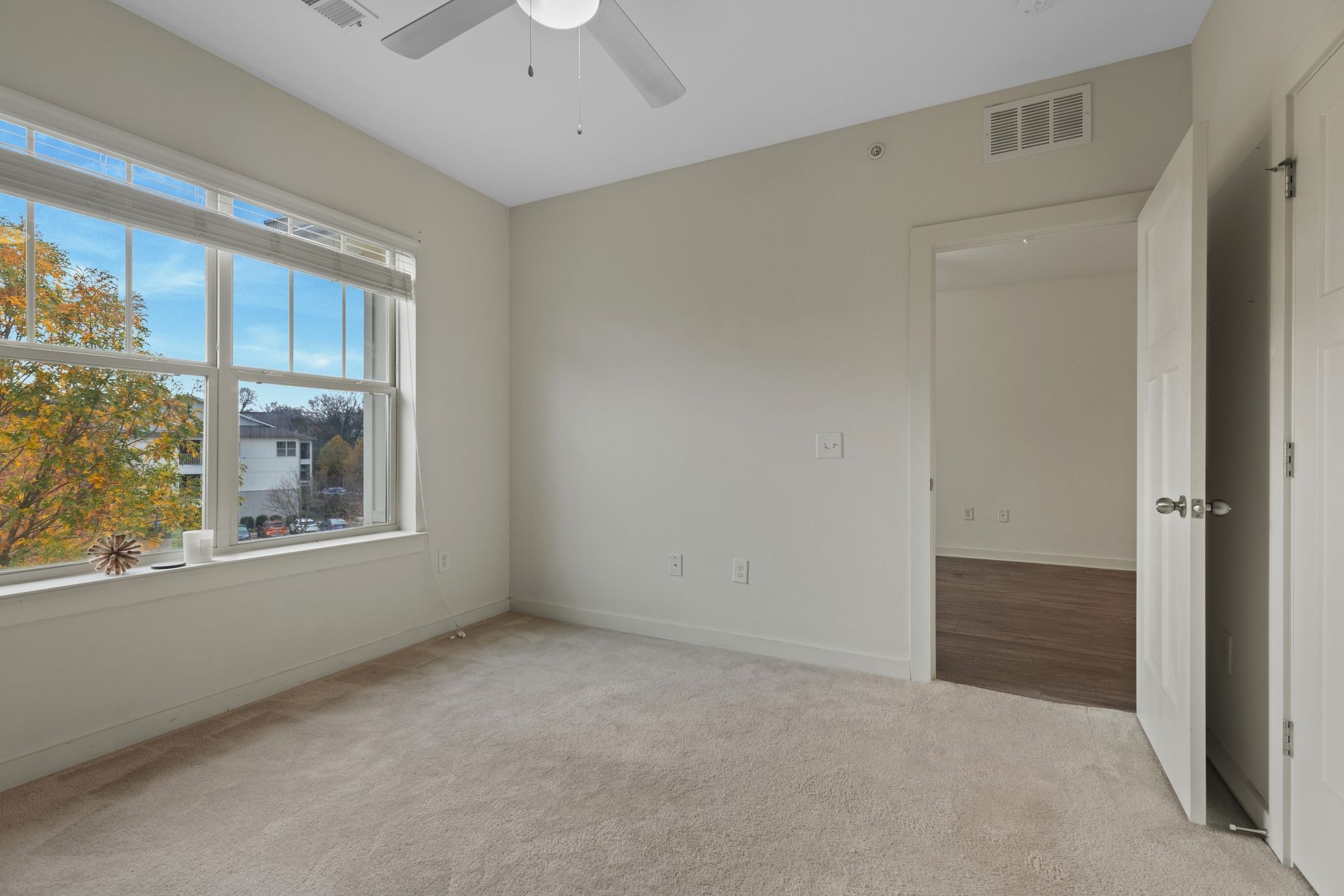 410 Rosedale Avenue, Unit 302 Nashville, TN 37211 - Photo 8 of 13 a view of an empty room with a window