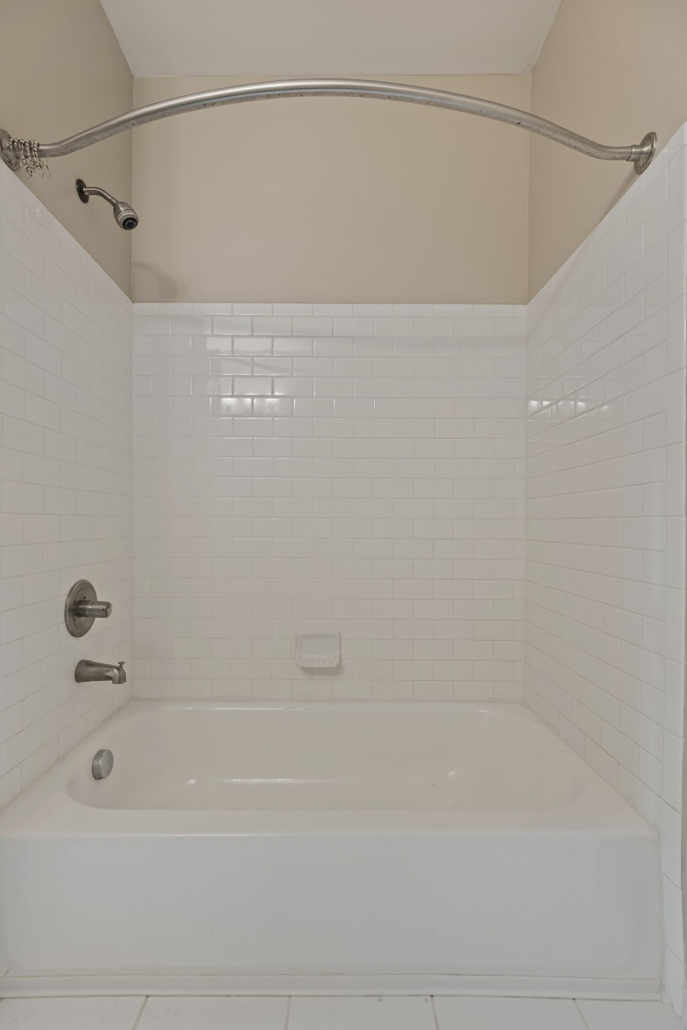 410 Rosedale Avenue, Unit 302 Nashville, TN 37211 - Photo 10 of 13 a bathroom with a shower and a bath tub