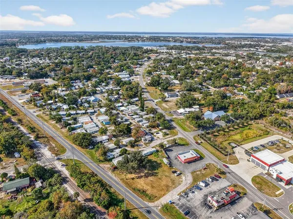 an aerial view of residential building and parking space