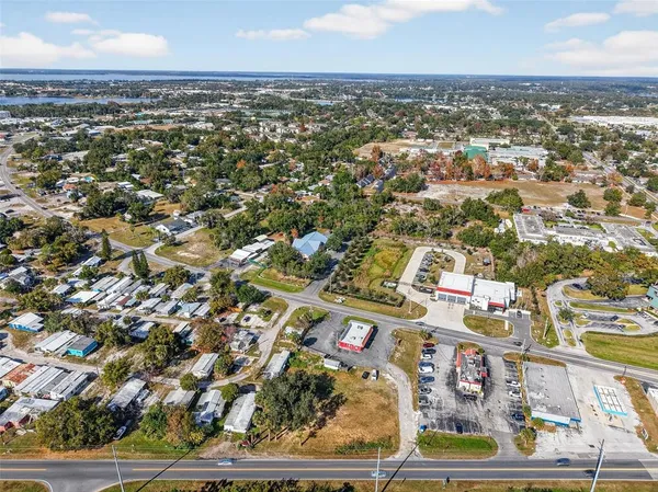 an aerial view of residential building and parking space