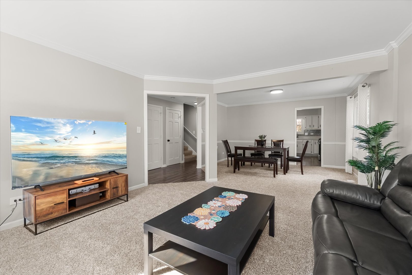 1763 Frost Lane Naperville, IL 60564 - Photo 11 of 46 a living room with furniture and a flat screen tv