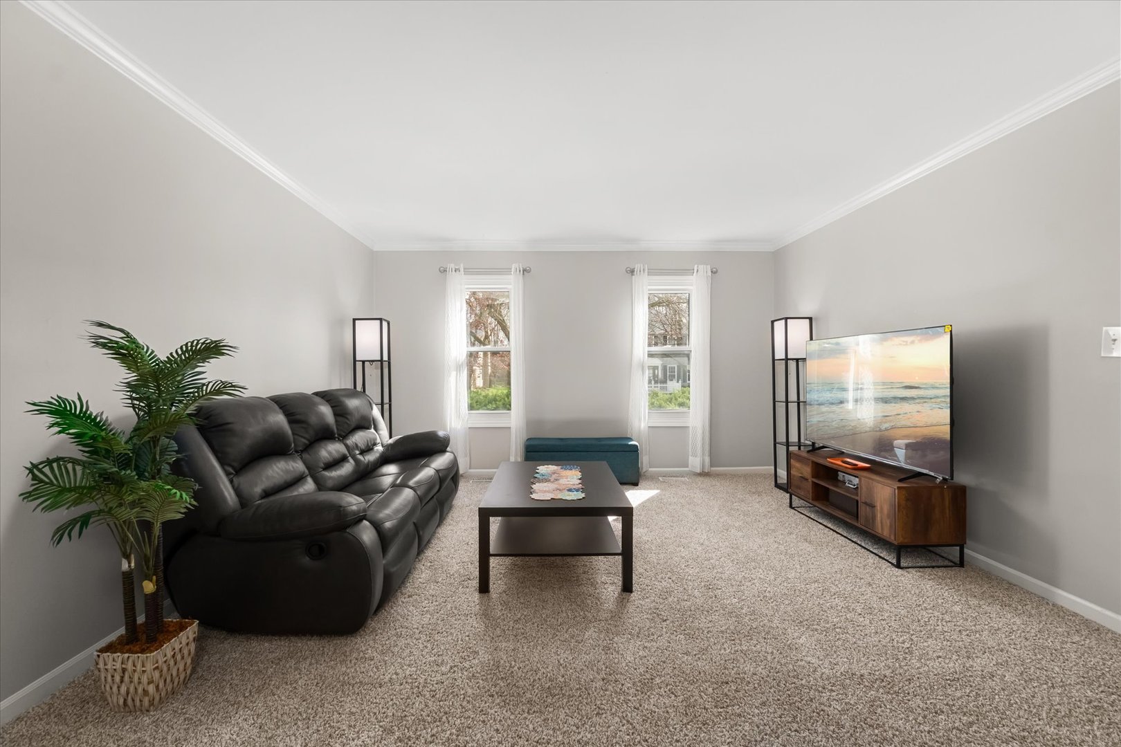 1763 Frost Lane Naperville, IL 60564 - Photo 12 of 46 a living room with furniture and a flat screen tv