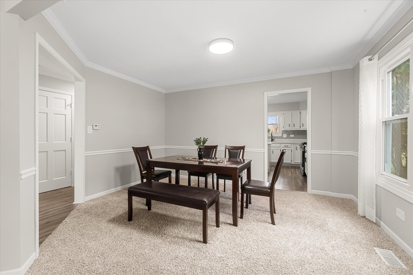 1763 Frost Lane Naperville, IL 60564 - Photo 13 of 46 a dining room with furniture and window