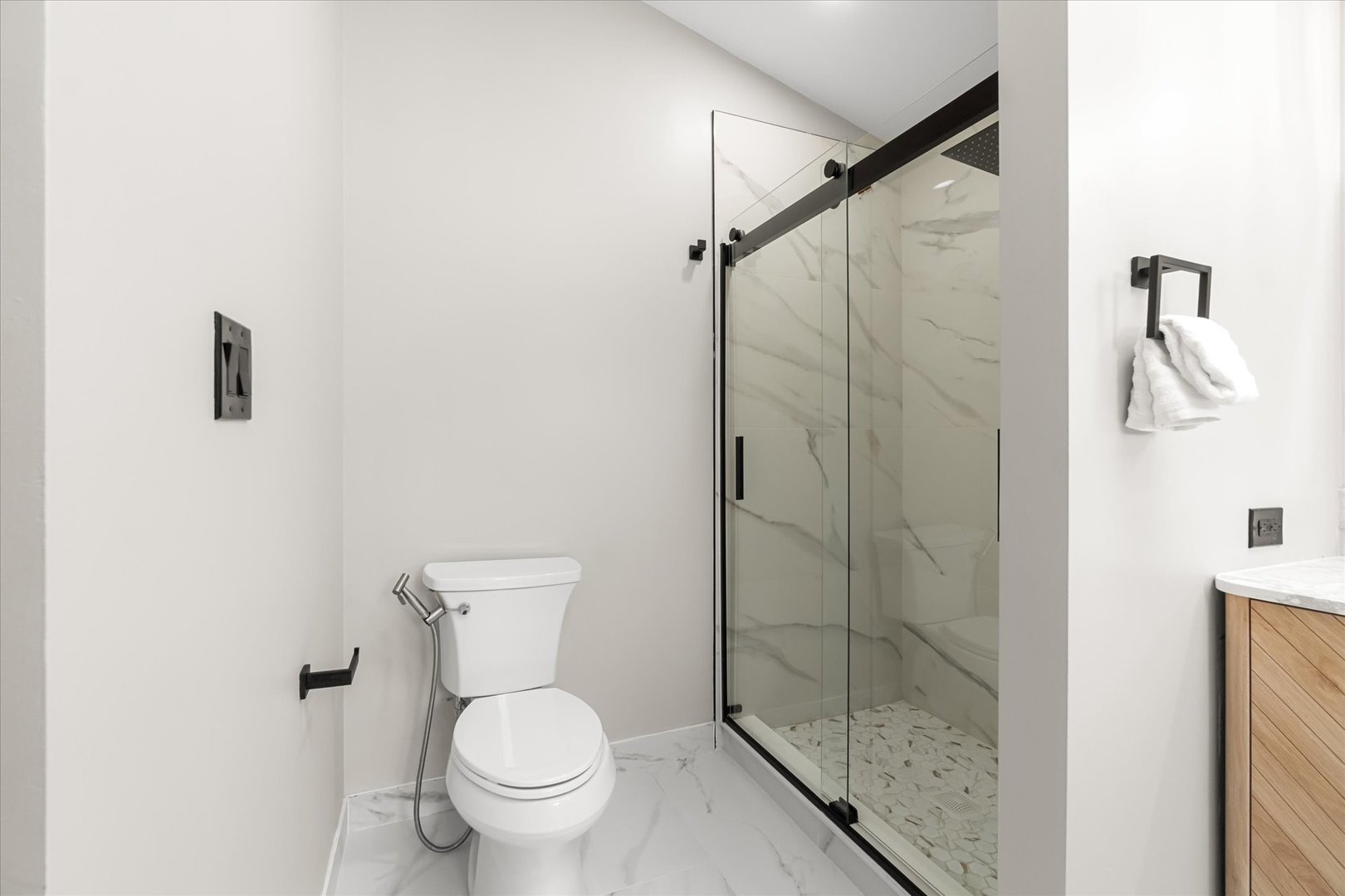 1763 Frost Lane Naperville, IL 60564 - Photo 18 of 46 a white toilet sitting next to a bathroom sink