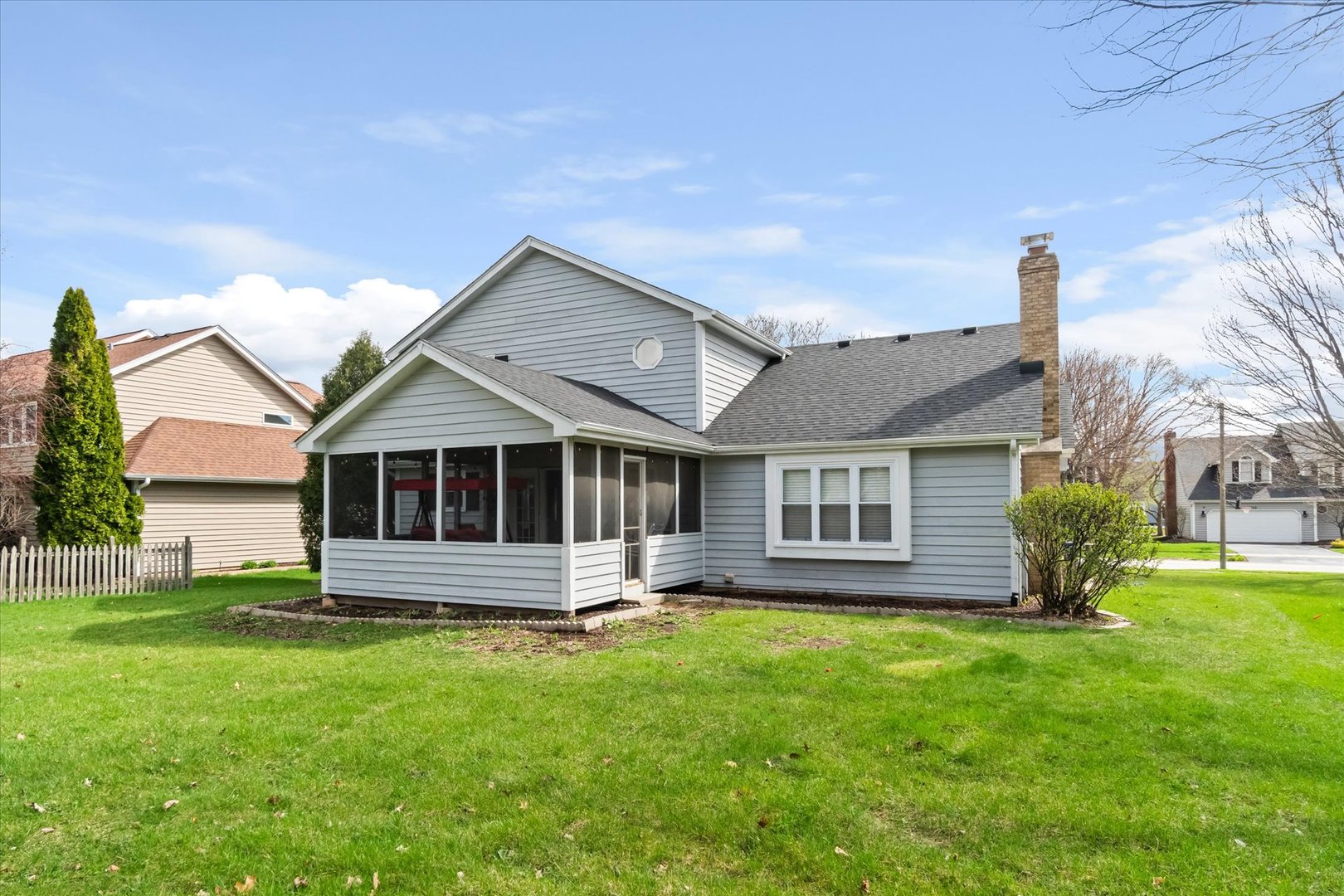 1763 Frost Lane Naperville, IL 60564 - Photo 27 of 46 a front view of a house with a yard