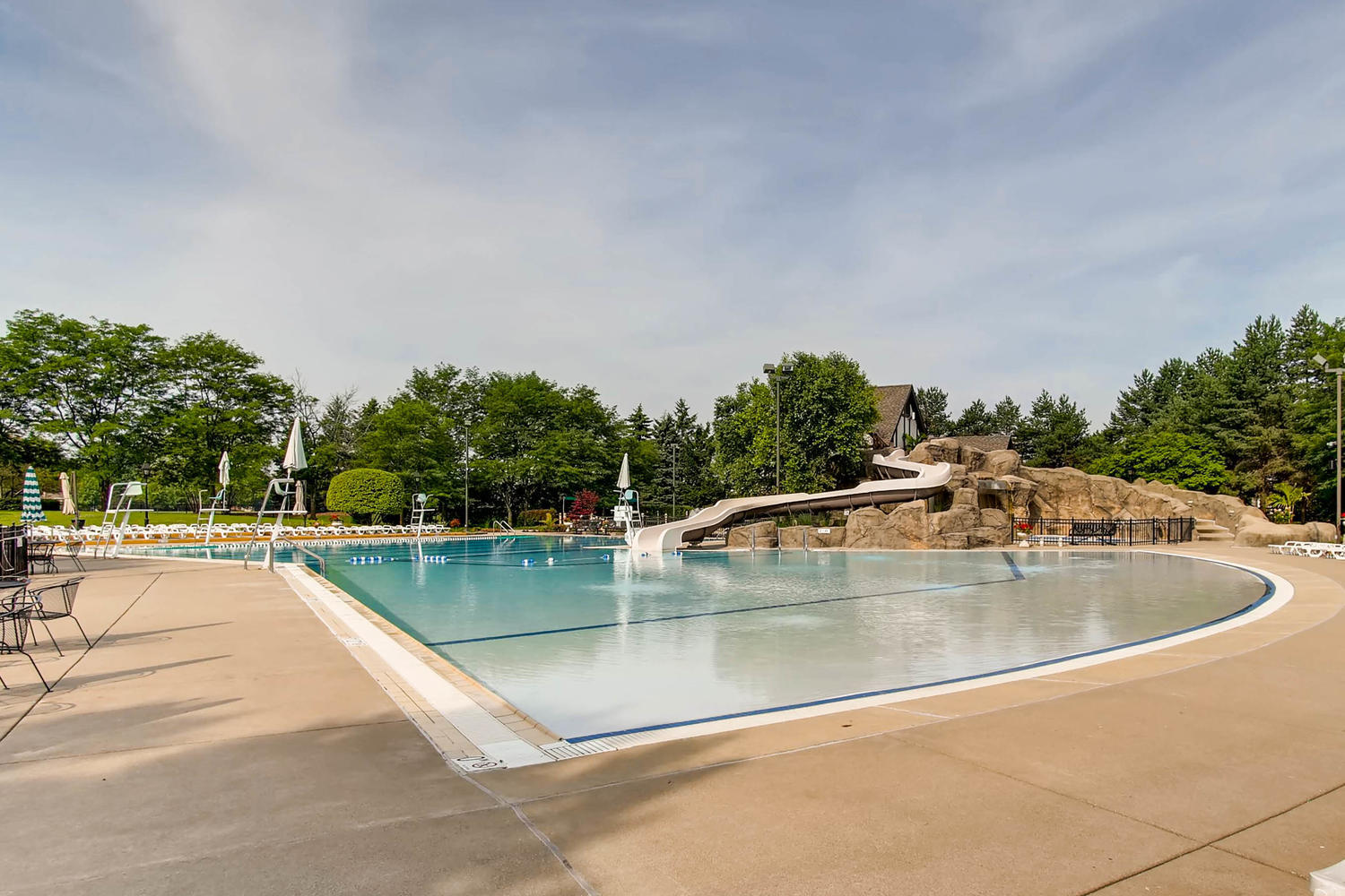 1763 Frost Lane Naperville, IL 60564 - Photo 29 of 46 a view of a swimming pool and lounge chairs