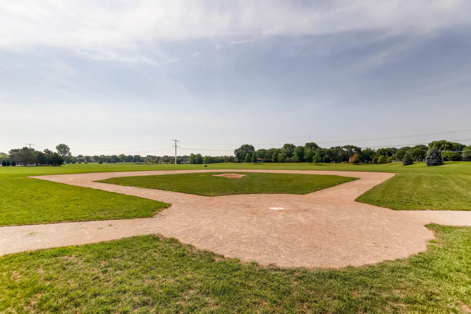 1763 Frost Lane Naperville, IL 60564 - Photo 40 of 46 a view of a swimming pool and a yard