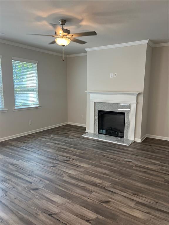 4524 Ajo Walk Atlanta, GA 30331 - Photo 24 of 40 a view of an empty room with wooden floor fireplace and a window