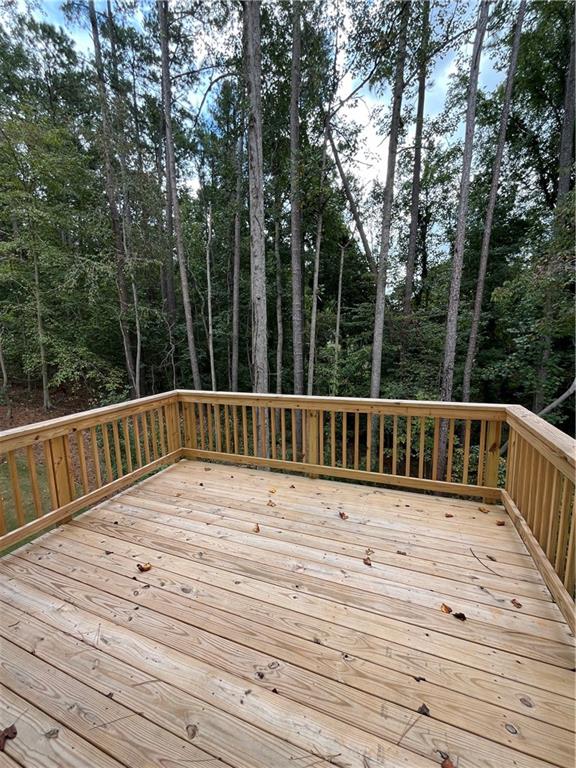 4524 Ajo Walk Atlanta, GA 30331 - Photo 30 of 40 a view of balcony with wooden floor and fence