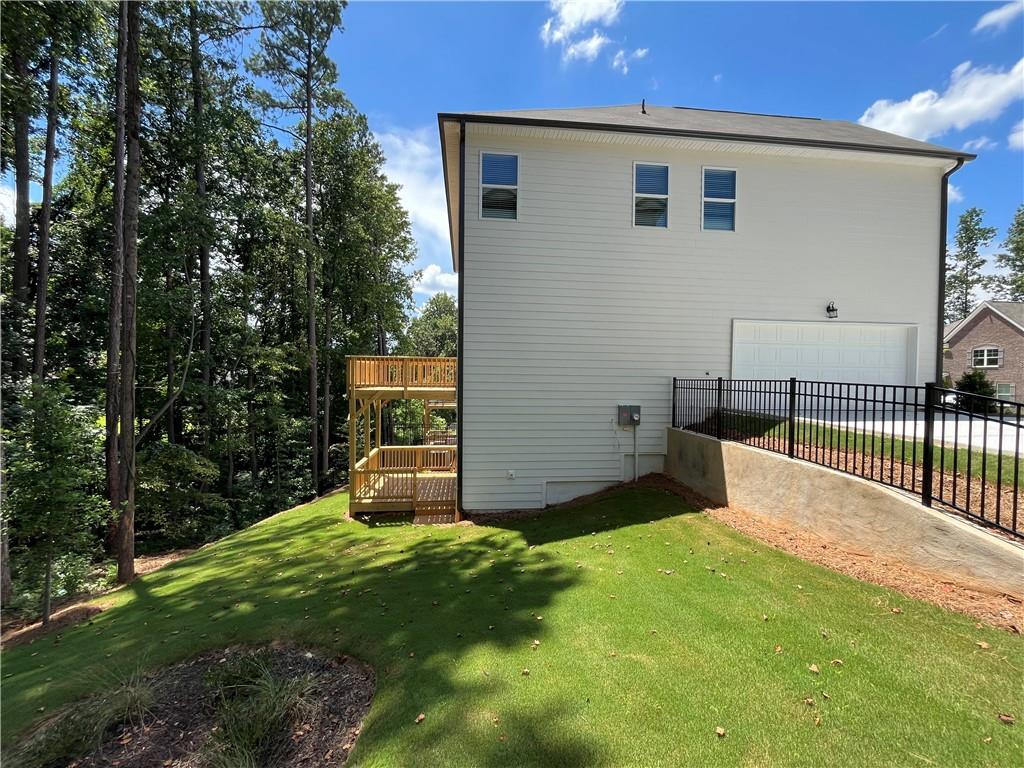4524 Ajo Walk Atlanta, GA 30331 - Photo 33 of 40 a view of a house with backyard and garden