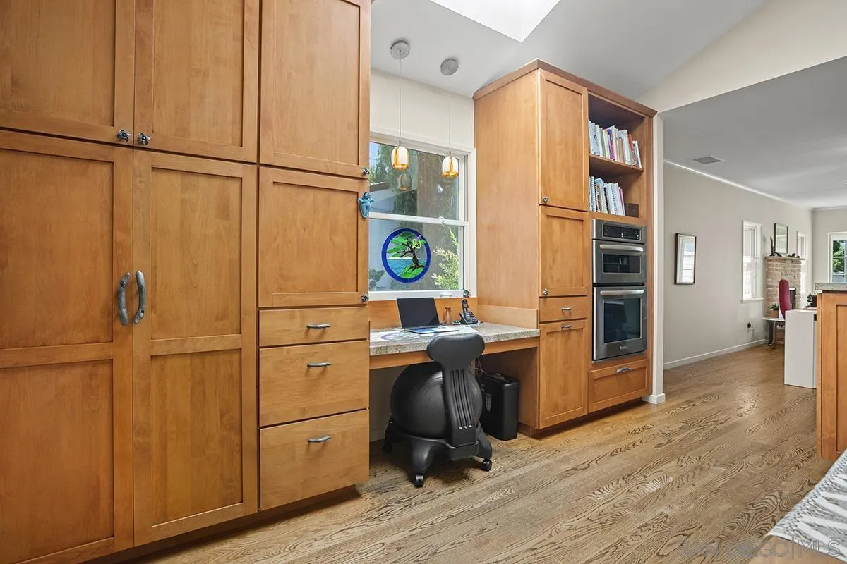 4329 Arista Street San Diego, CA 92103 - Photo 17 of 44 a view of workspace with wooden floor windows