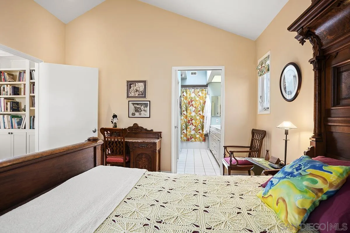 4329 Arista Street San Diego, CA 92103 - Photo 20 of 44 a bedroom with a bed and wooden floor