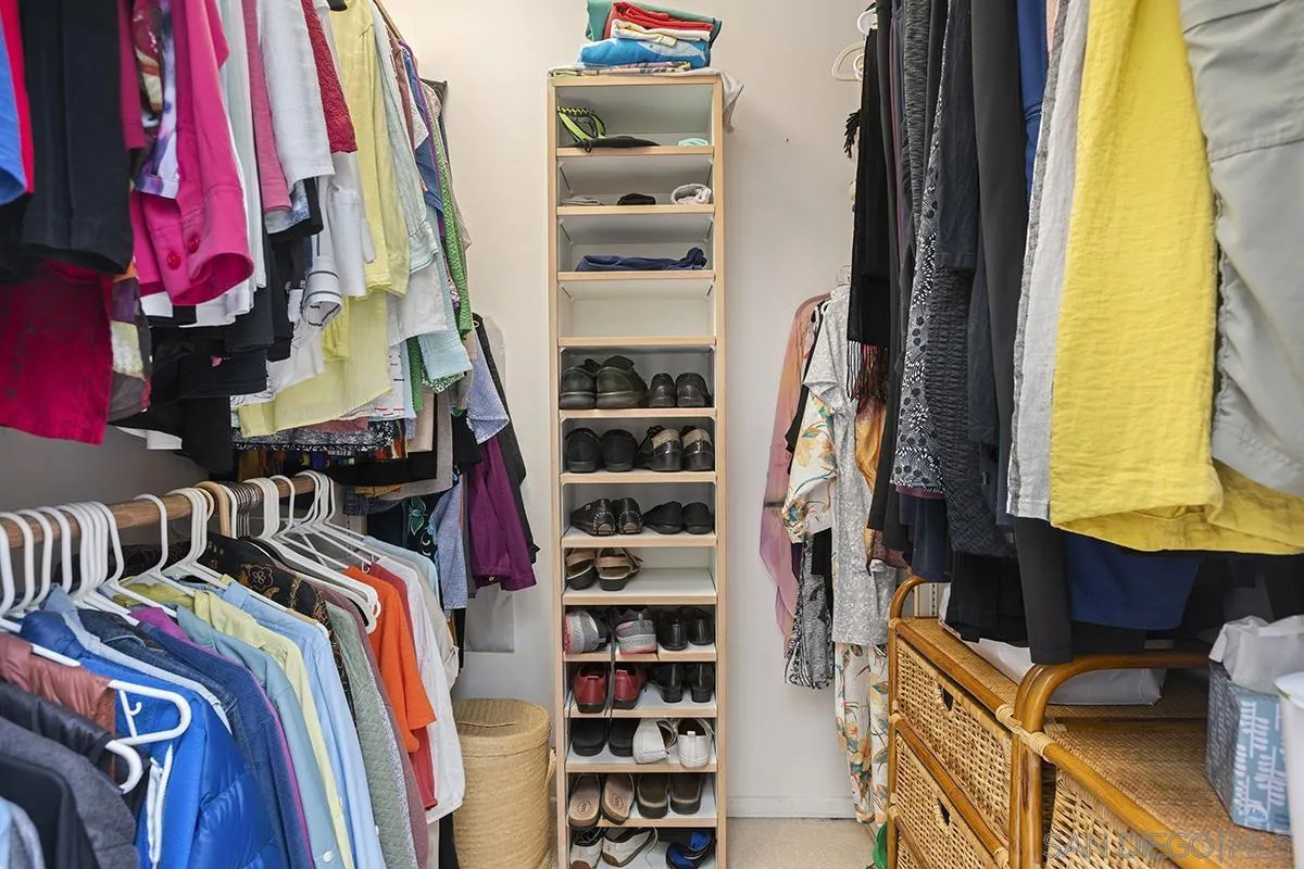 4329 Arista Street San Diego, CA 92103 - Photo 25 of 44 a view of walk in closet with clothes and shoes