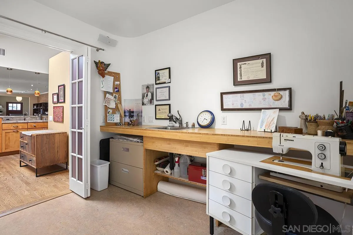 4329 Arista Street San Diego, CA 92103 - Photo 29 of 44 a view of a kitchen with a sink and cabinets