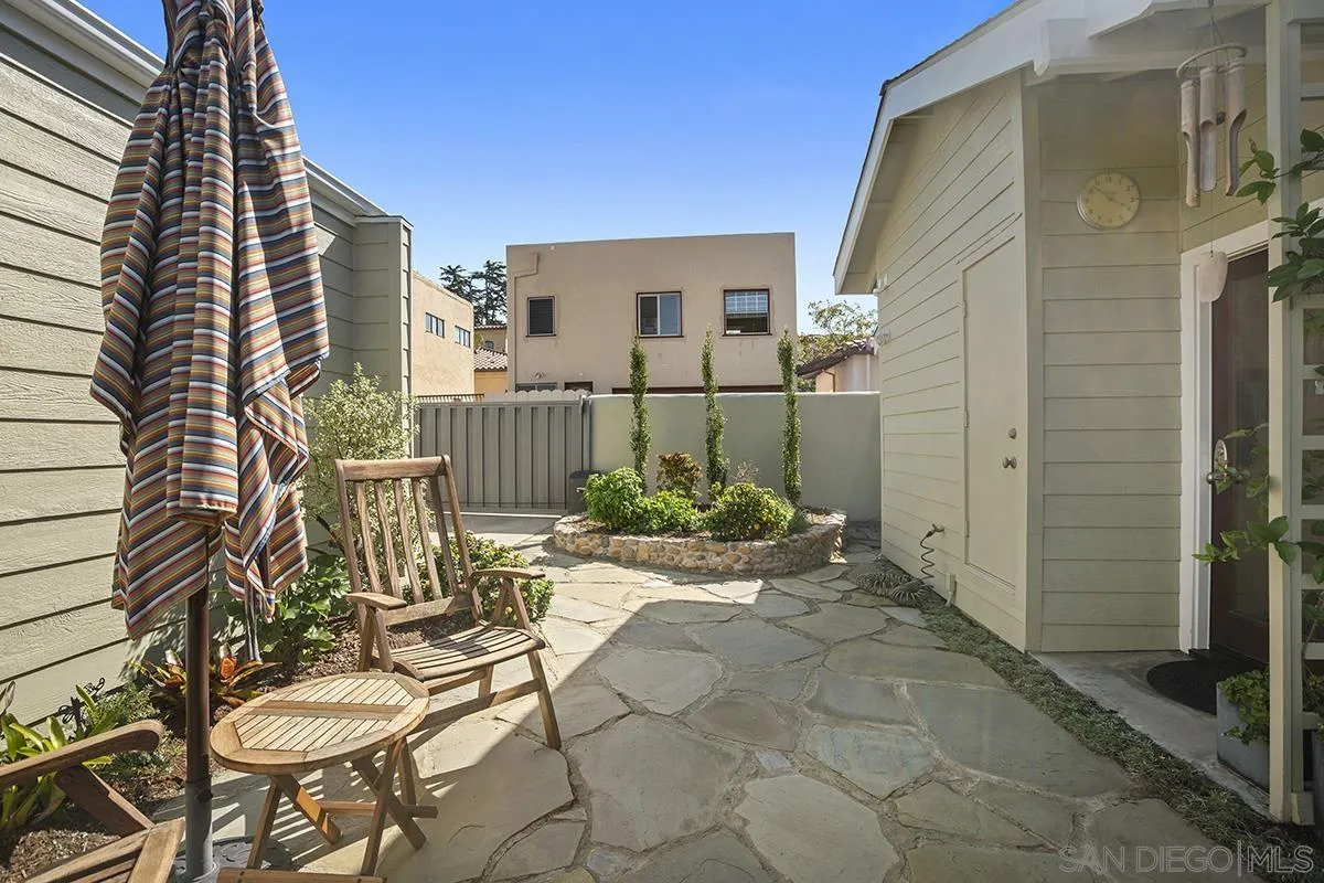 4329 Arista Street San Diego, CA 92103 - Photo 36 of 44 a view of a chairs and table in backyard