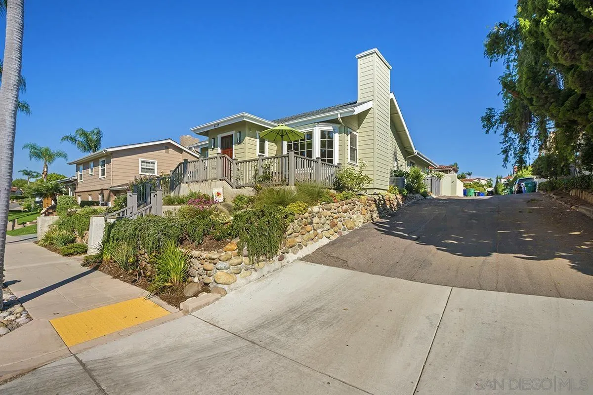 4329 Arista Street San Diego, CA 92103 - Photo 42 of 44 a front view of a house with a yard