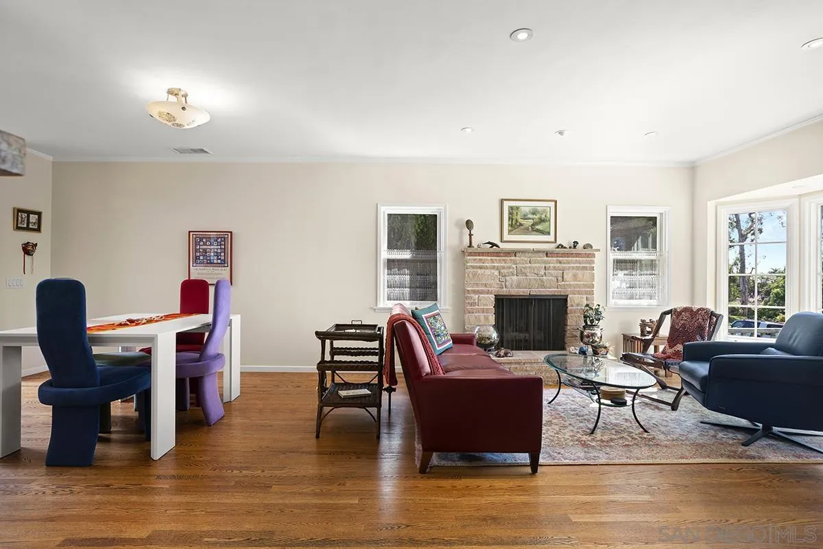 4329 Arista Street San Diego, CA 92103 - Photo 9 of 44 a living room with furniture and a fireplace