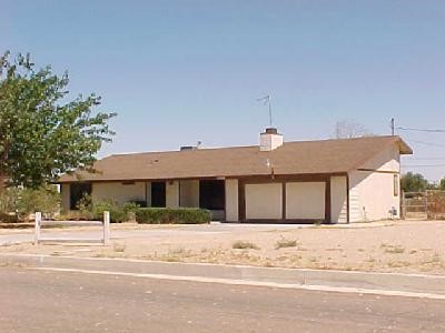 13269 Llano Road Victorville, CA 92392 - Photo 1 of 1 a front view of a house