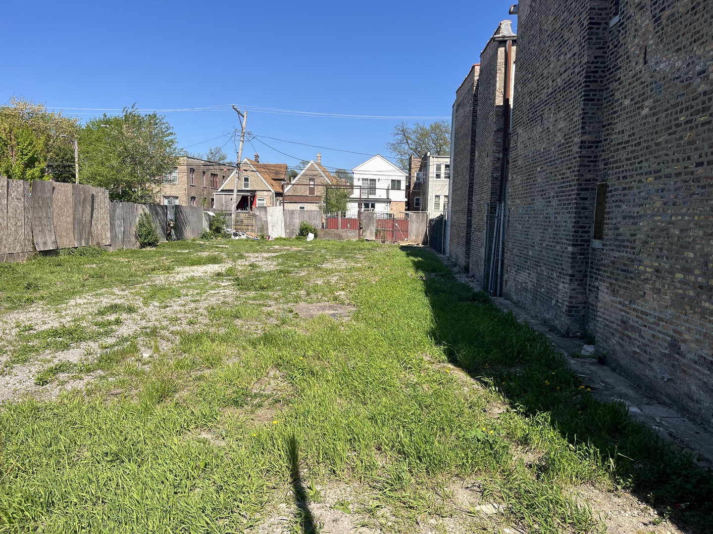 1125 North Pulaski Road Chicago, IL 60651 - Photo 2 of 3 a view of a street with a building in the background
