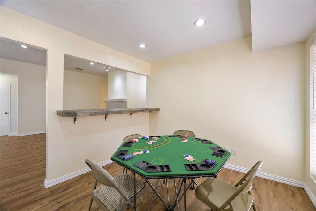 6512 Mc Cormick Ranch Court Plano, TX 75023 - Photo 13 of 29 a view of a dining room with furniture and wooden floor