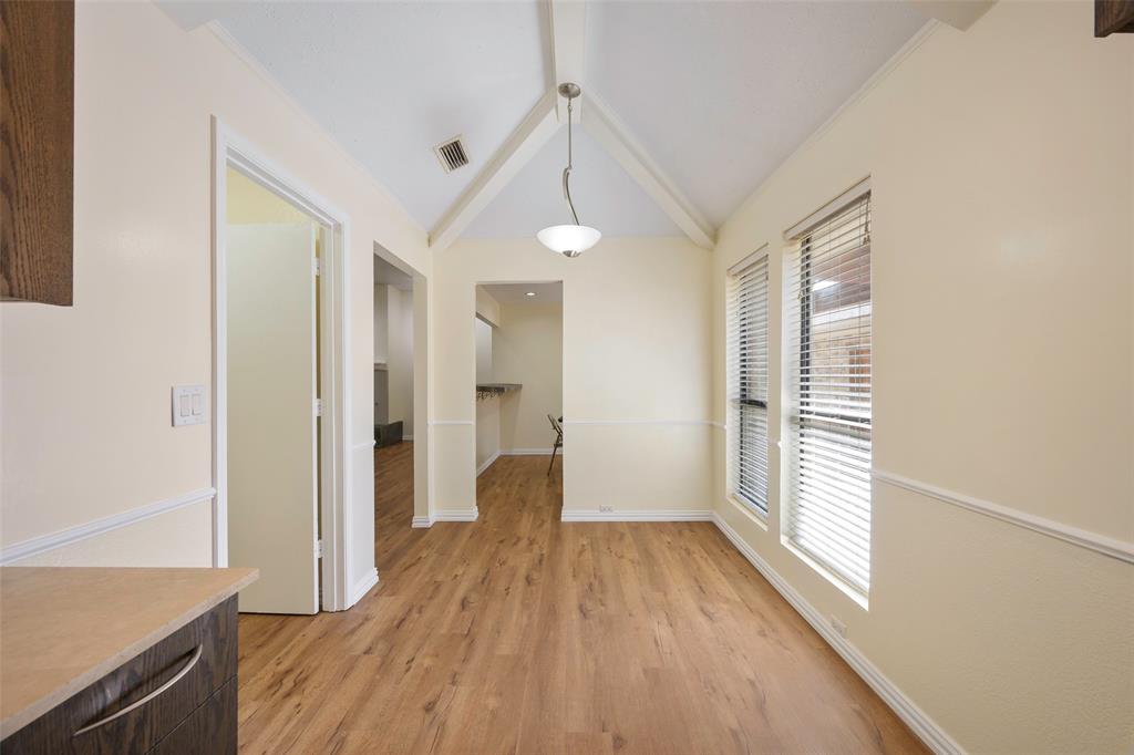 6512 Mc Cormick Ranch Court Plano, TX 75023 - Photo 16 of 29 a view of wooden floor and windows in a room