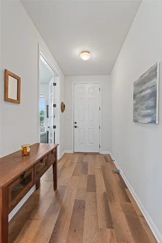 a room with a bed and a desk